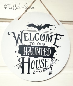 Welcome to our Haunted House Door Hanger